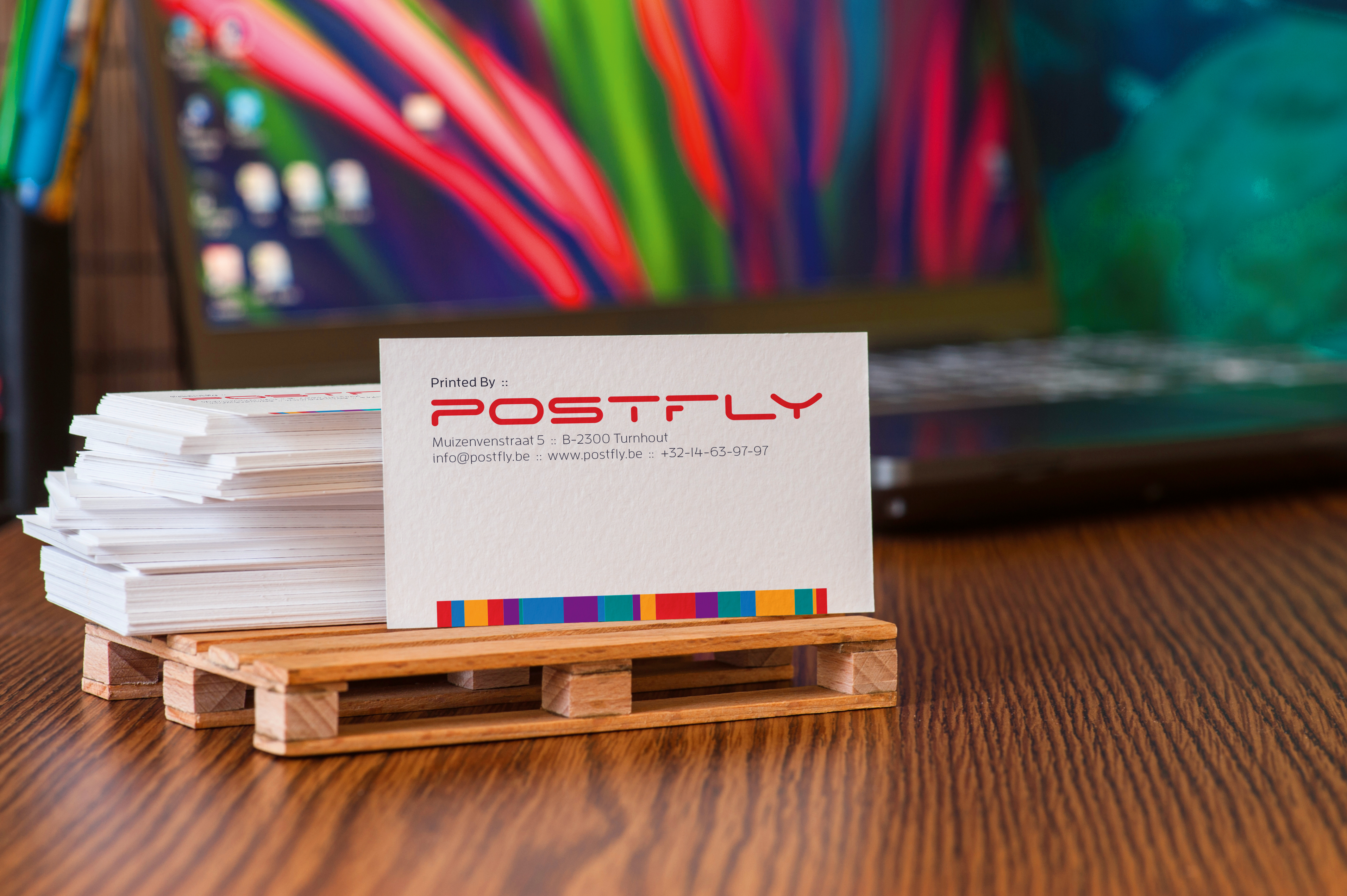 Postfly visitekaartjes bij de drukpers